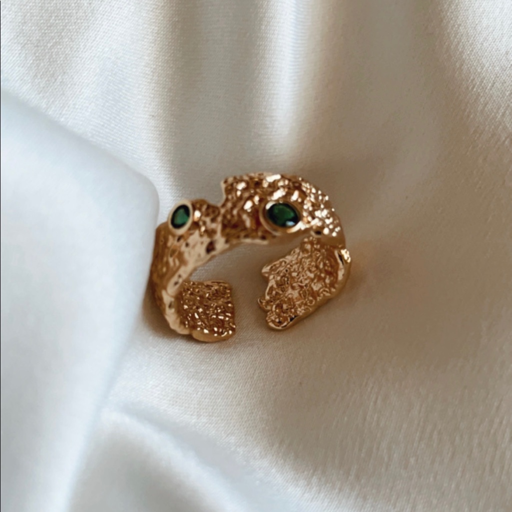 Elegant Gold Textured Ring With Green Accents